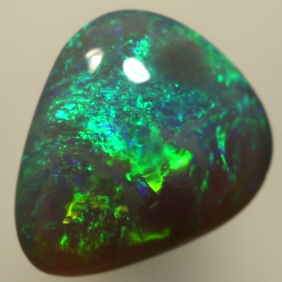 SOLID SEMI BLACK OPAL Sparkles of green and turquoise over a high dome